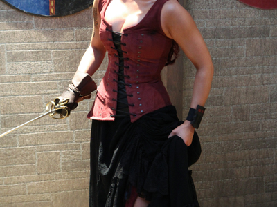 This pirate inspired, asymmetrical corset and skirt was created by Castle Corsetry for a Fonco produced Medieval time traveling music video, directed Fon Davis.  	